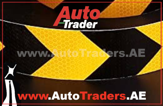 Decoding the Black and Yellow Arrow Sign Behind Trucks in Dubai - Auto Trader UAE