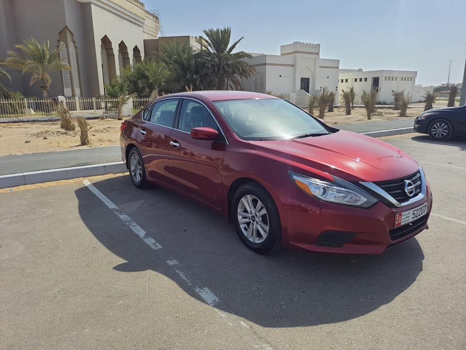 Nissan Altima Maroon color in Excellent condition